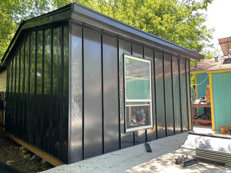 Black standing seam metal wall panels for Metal Roof Installation in Anderson